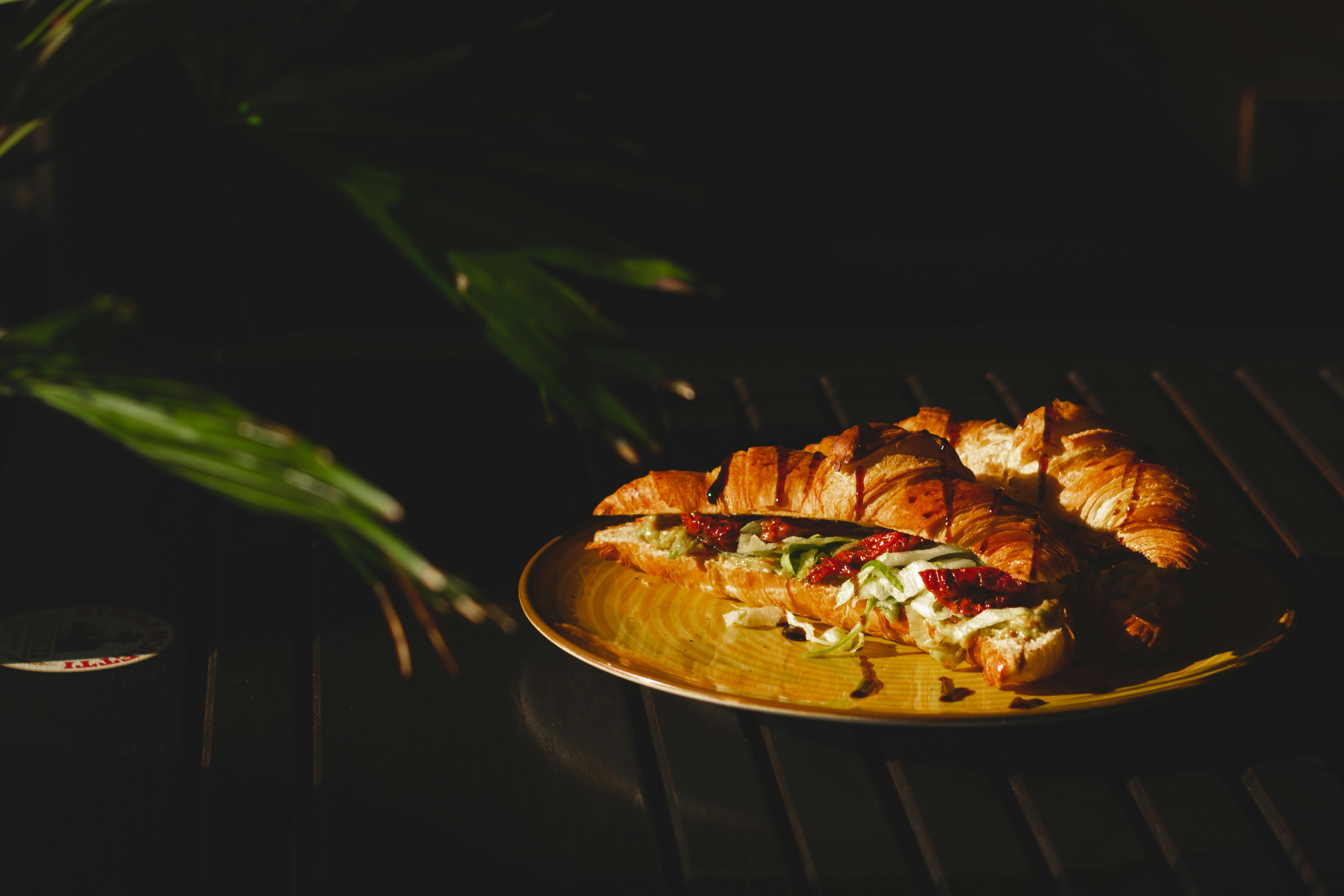 brown and white pastry on brown wooden table